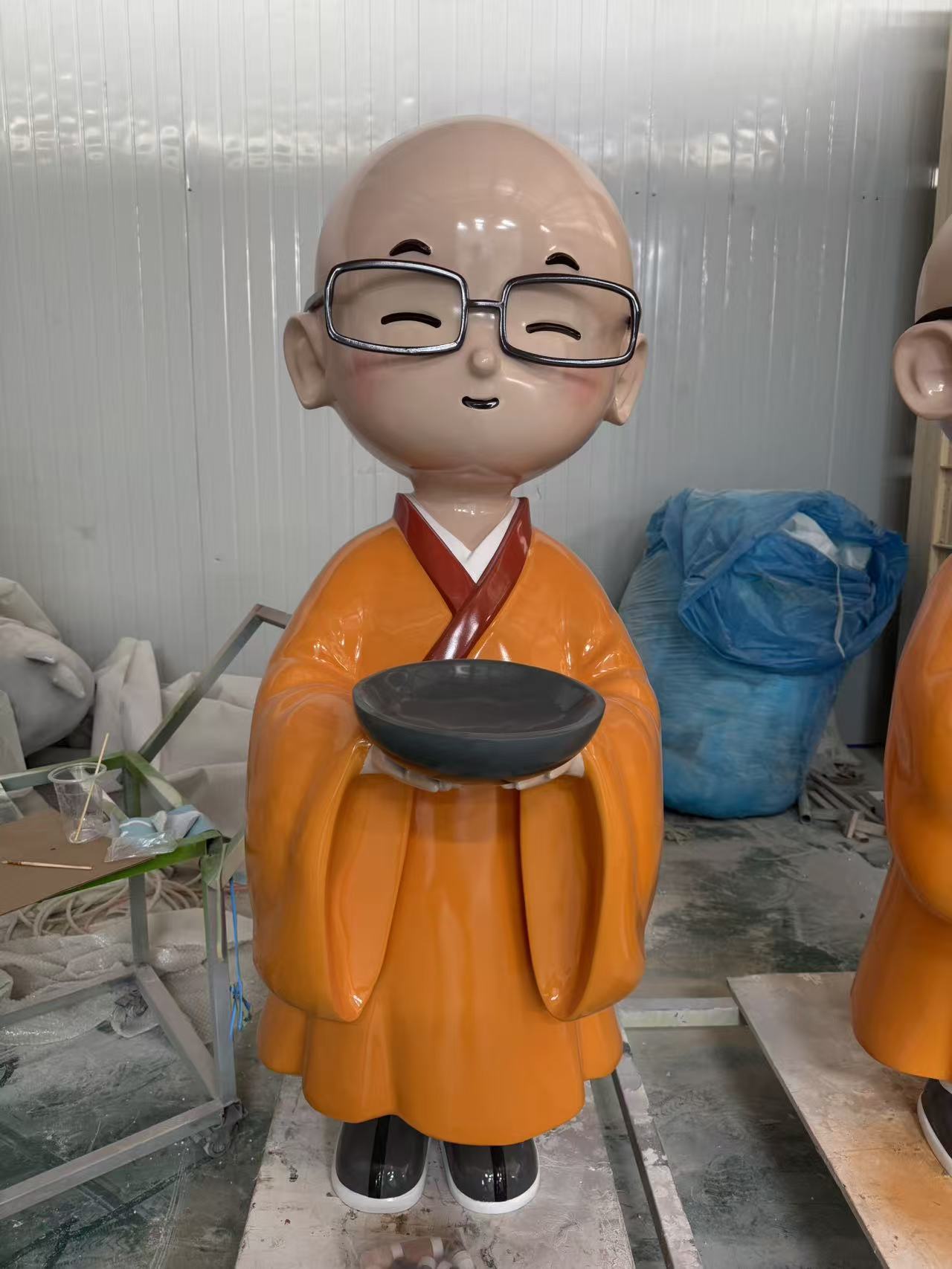 Character and IP sculpture in its original project or workshop setting