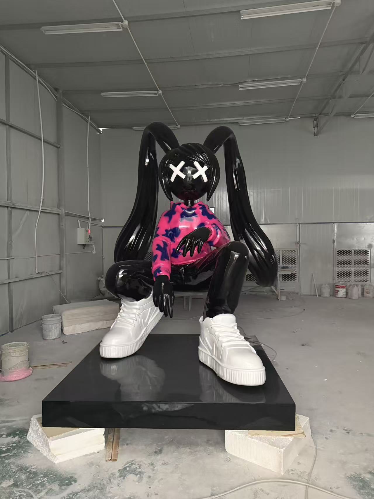 Character and IP sculpture in its original project or workshop setting