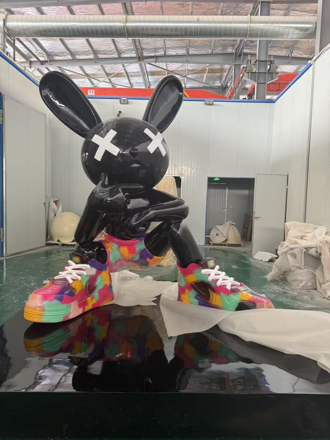Character and IP sculpture in its original project or workshop setting