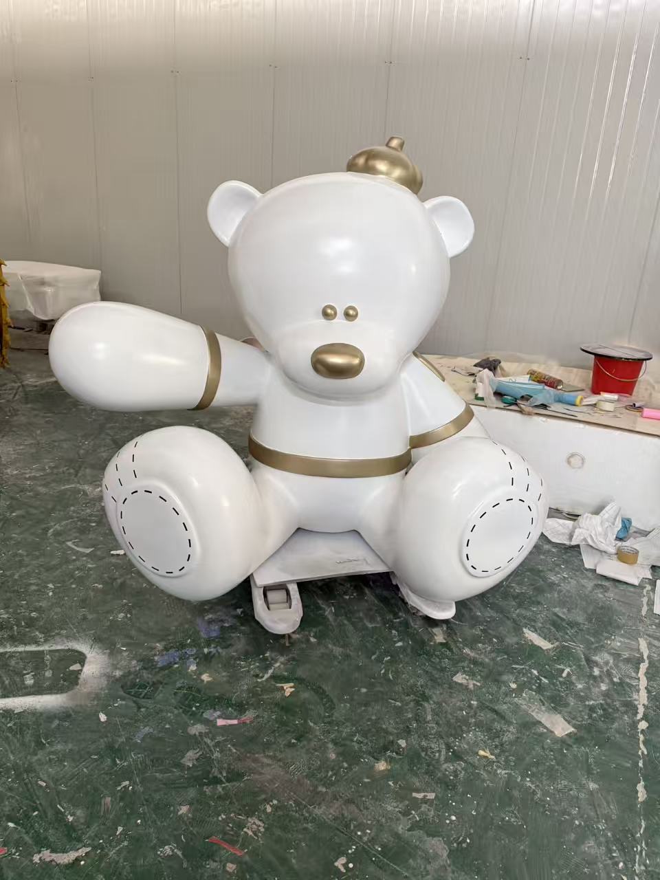 Character and IP sculpture in its original project or workshop setting