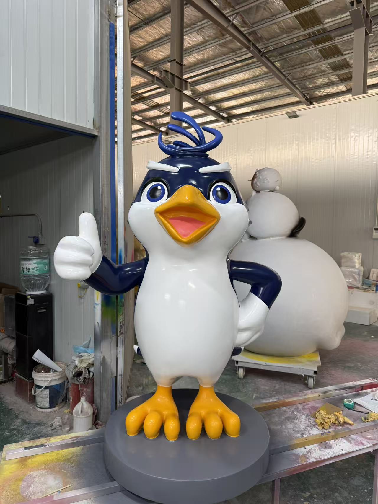 Character and IP sculpture in its original project or workshop setting