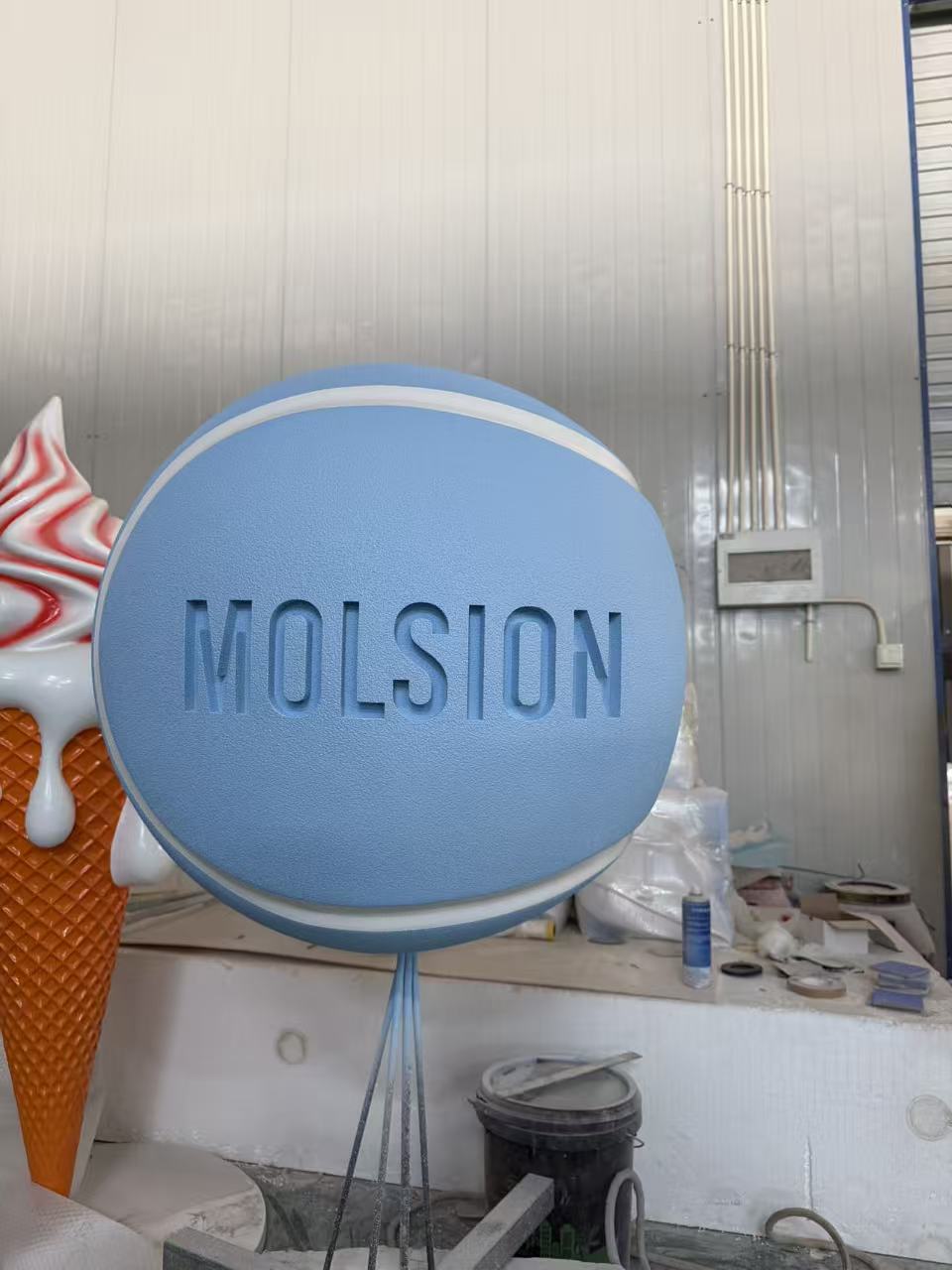 Custom landmark sculpture in its original project or workshop setting
