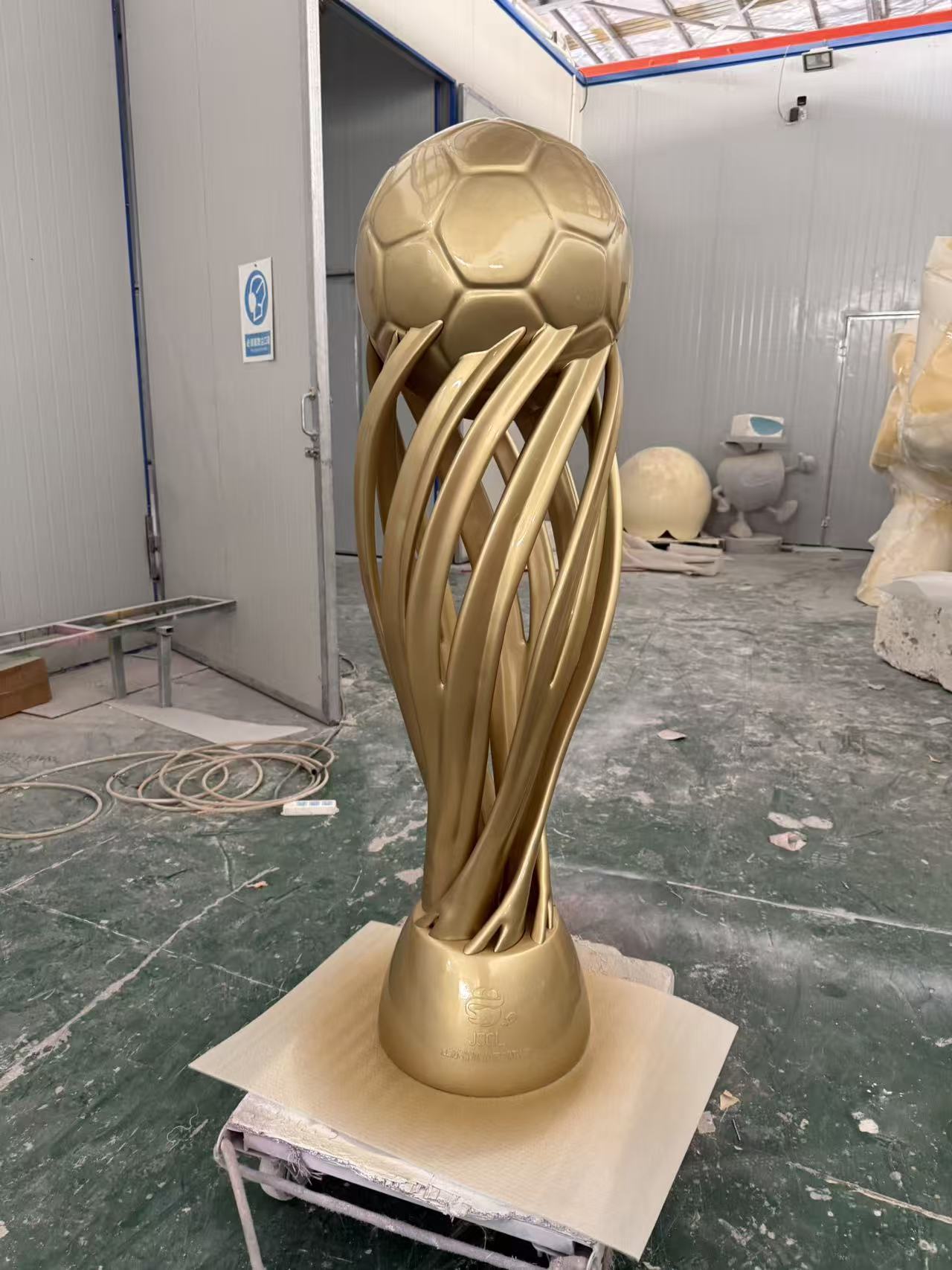 Custom landmark sculpture in its original project or workshop setting