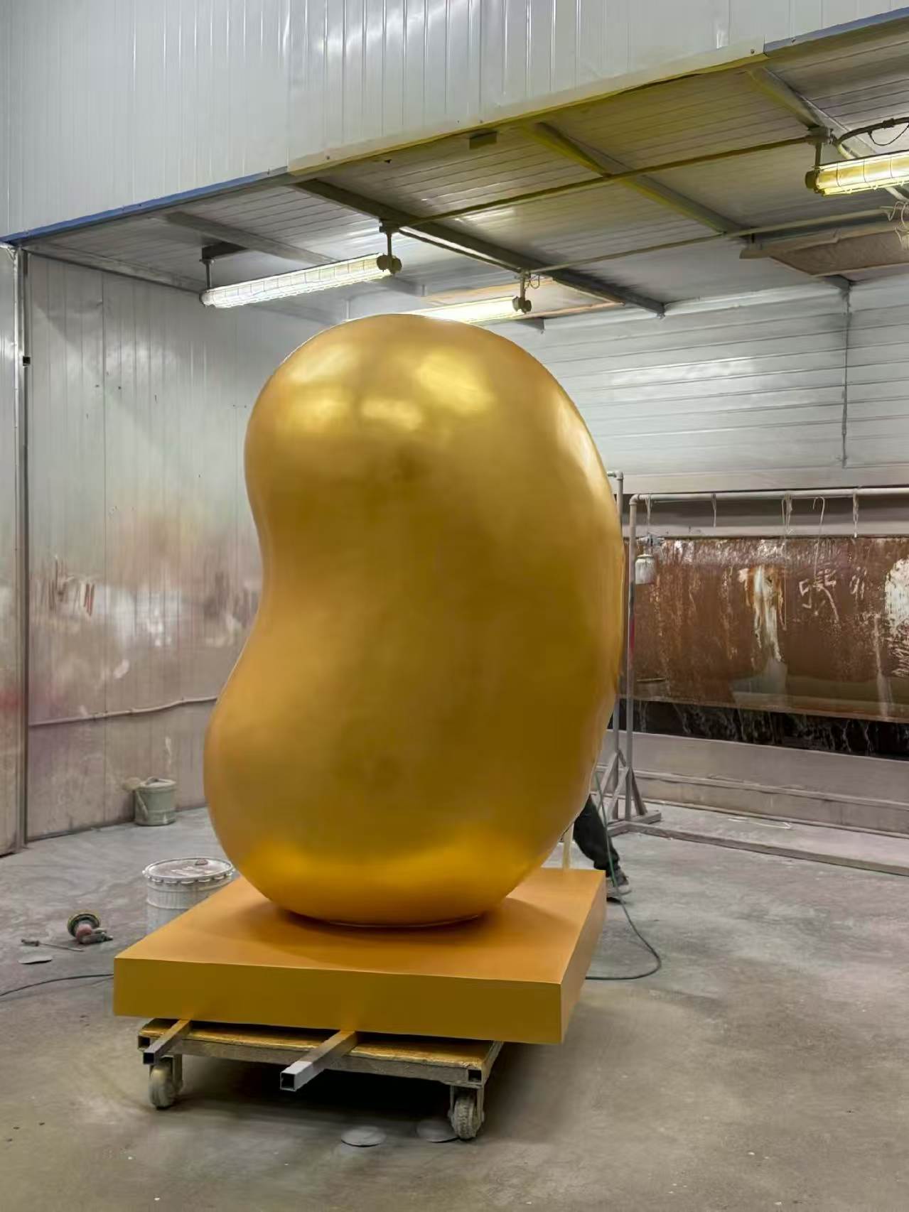 Custom landmark sculpture in its original project or workshop setting